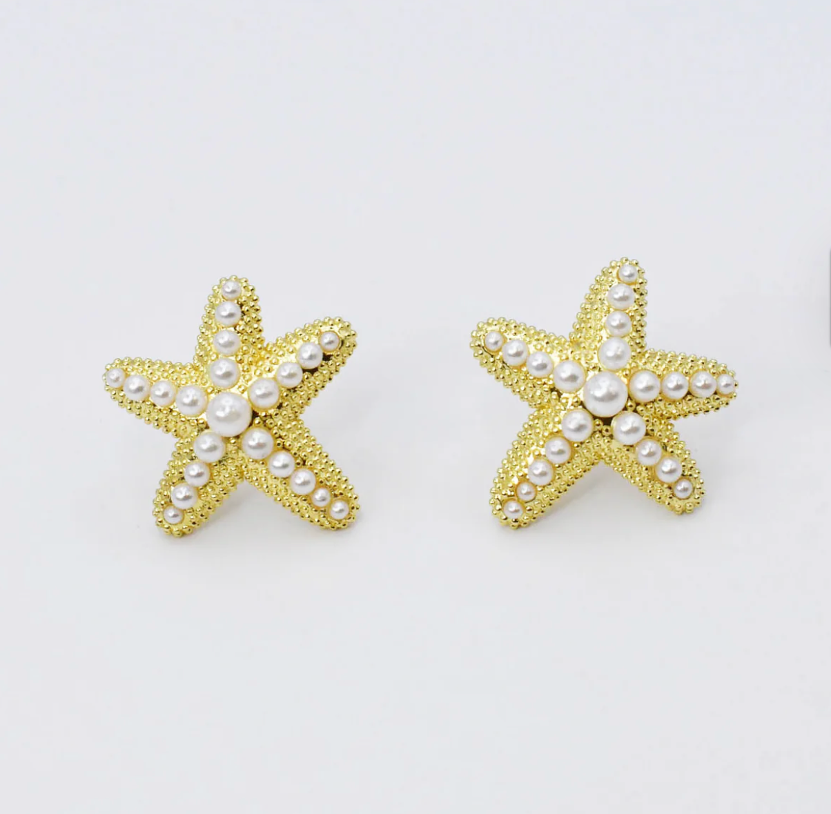 By the sea gold studs