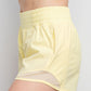 RECYCLED ACTIVE SHORT WITH MESH Lemon Cream