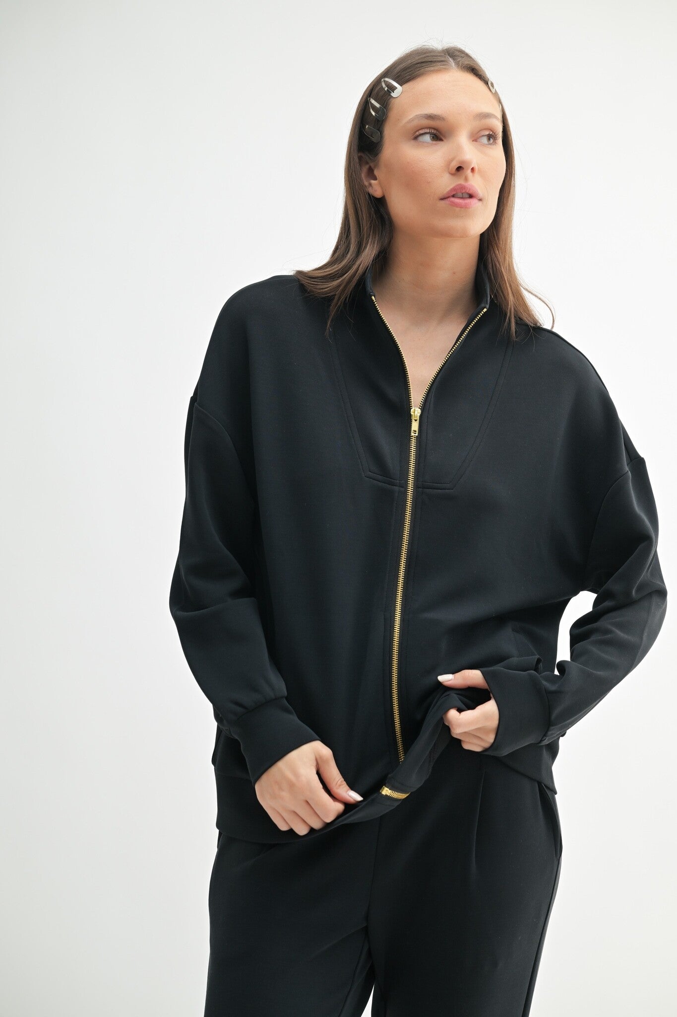 Black zip up jacket with gold