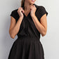 Black quarter zip romper