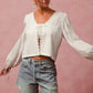 Sarah off white floral eyelet top