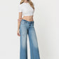 Vervet Low Rise Tinted Medium Wash Wide Flare Jeans