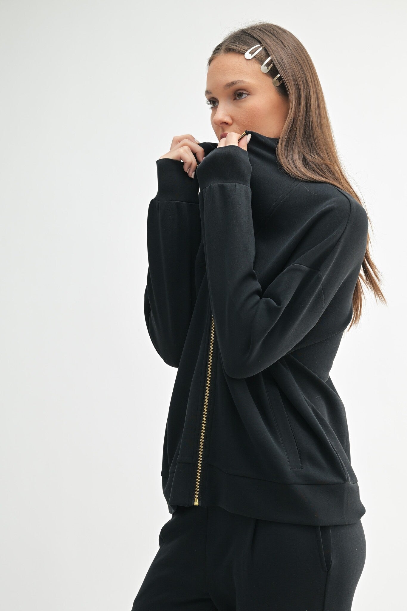 Black zip up jacket with gold