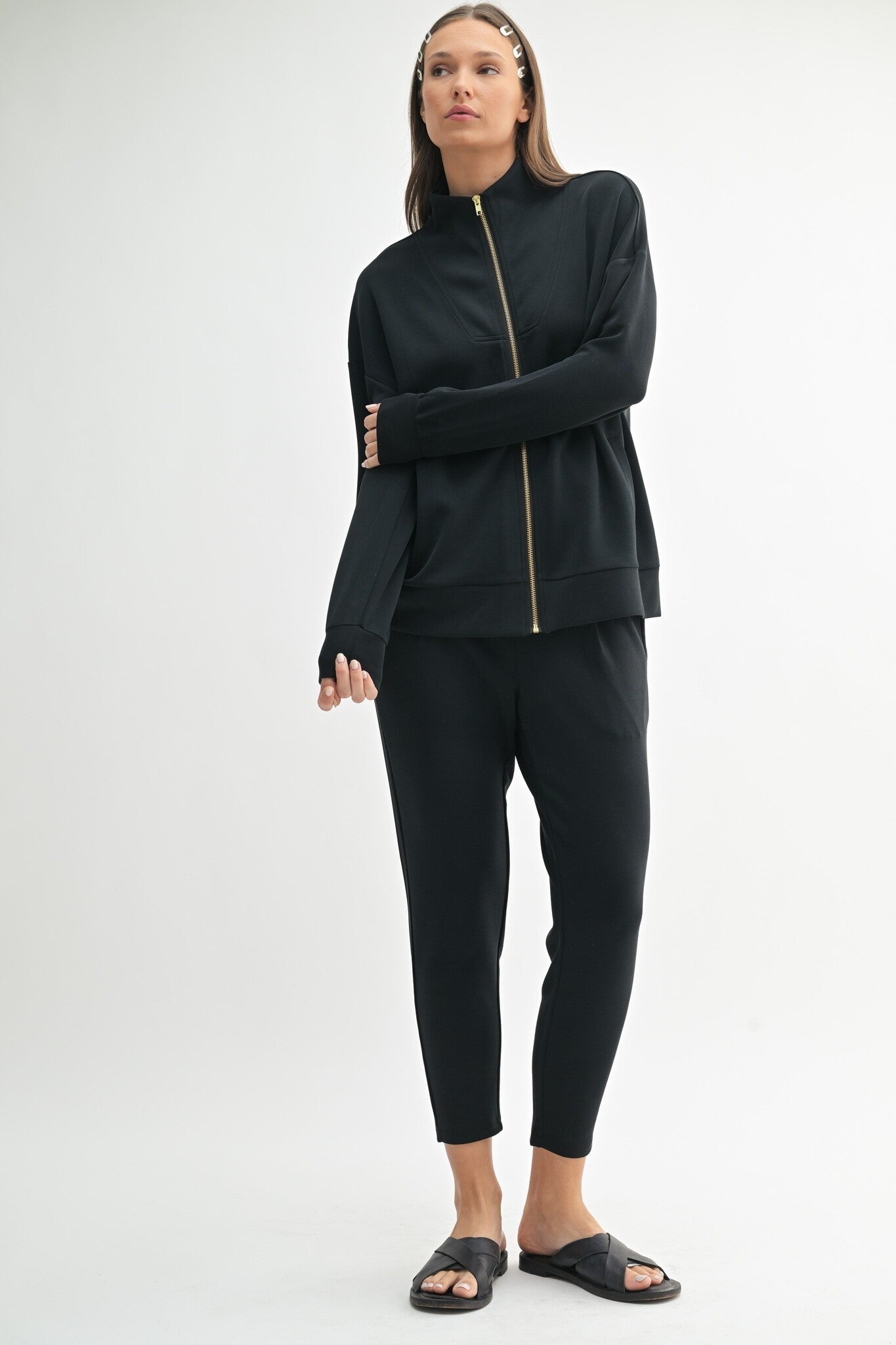 Black zip up jacket with gold